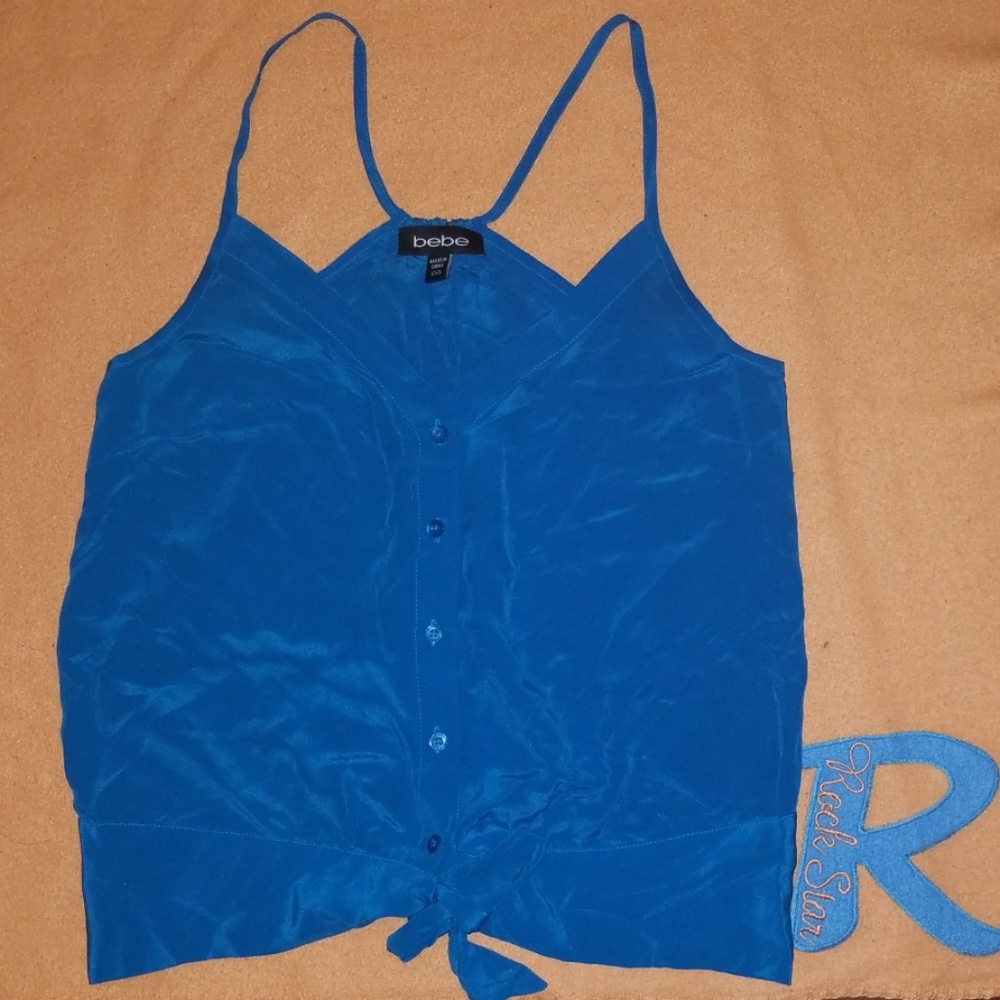 Bebe size xxsmall ladies silk shirt.